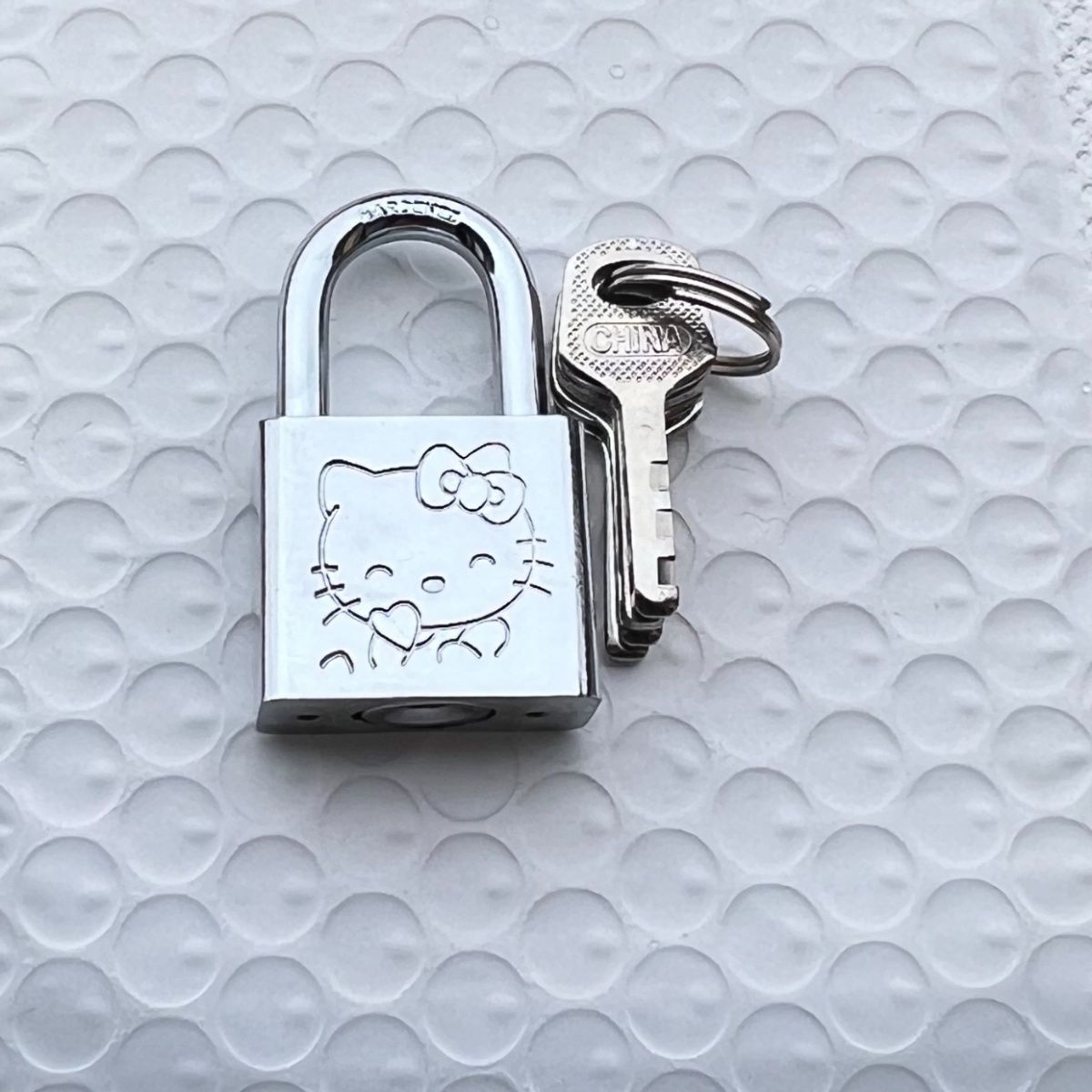 ตุ๊กตาเฮลโลคิตตี้ การ์ตูนน่ารั - Home Security Gate บทวิจารณ์และราคา